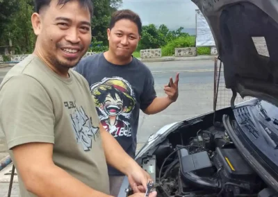 Jet Battery Trading team assisting with roadside car battery replacement service in Rizal.