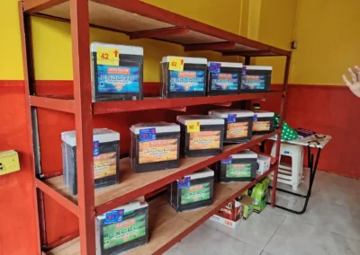 Display of Motolite Gold, Excel, and Enduro batteries inside Jet Battery Trading battery shop in Rizal